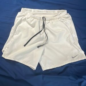 White Nike running short Size Small used.
